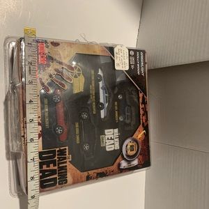 Green light Walking Dead cars, total of three, limited edition still in case.